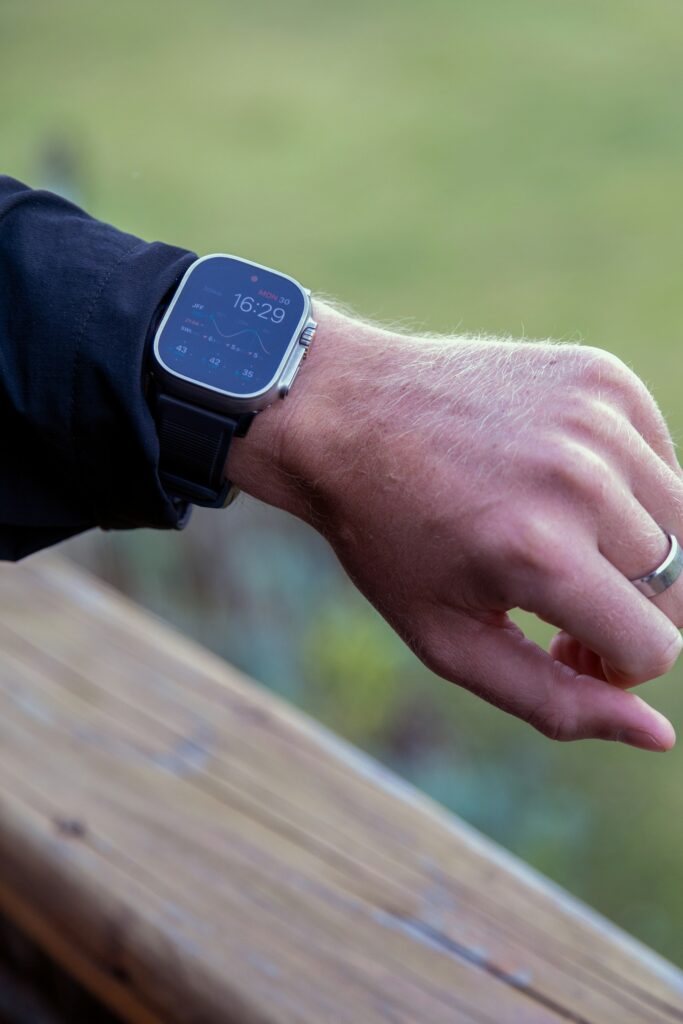 Person checking time on a smartwatch