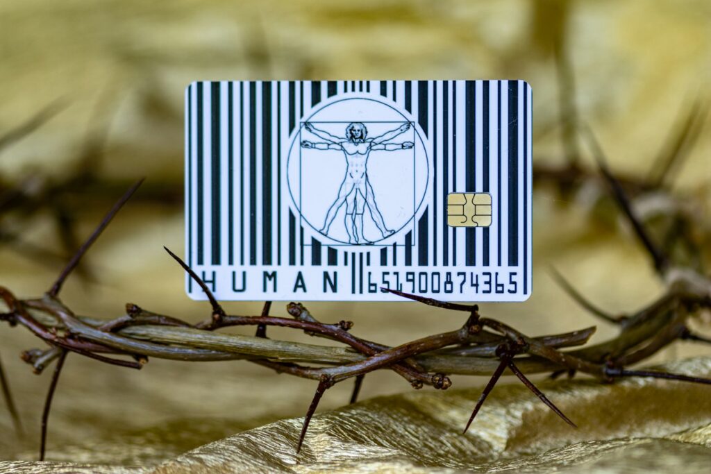 A close up of a barcode with a picture of jesus on it